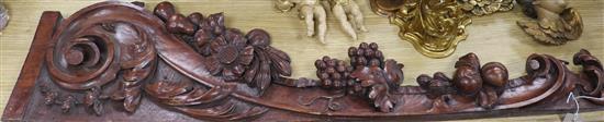 A pair of carved wood panels Length 108cm